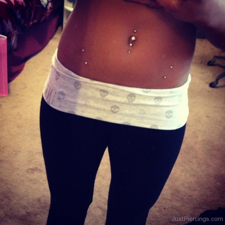 Double Belly Button Piercing and Hips