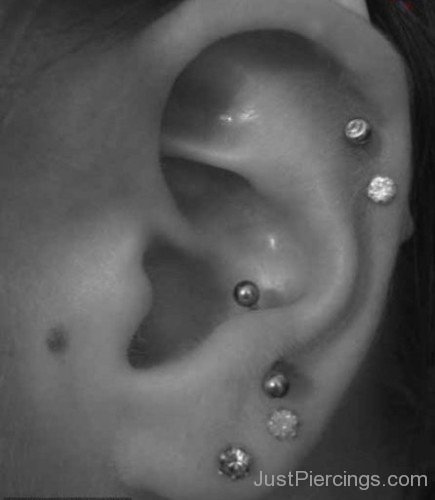 Silver Lobe and Anti Tragus Piercing