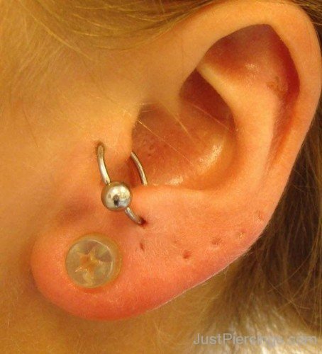 Anti Tragus Piercing to Tragus