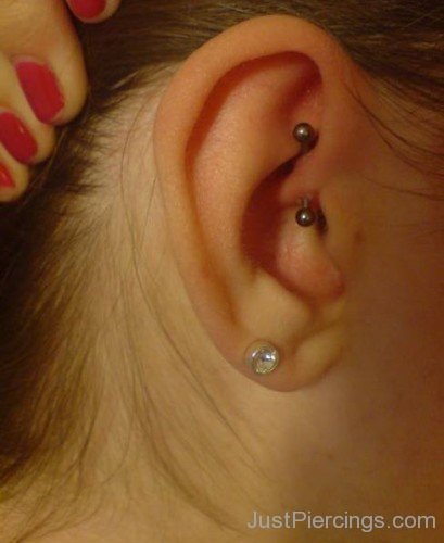 Daith Piercing with Banana Barbell and Lobe Piercing with Stud