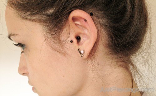 Lobe Black Tragus and Helix Piercing