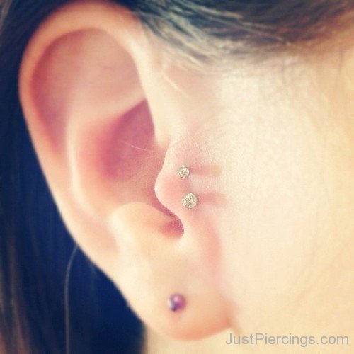 Purple Lobe and Tragus Piercing