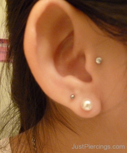 Single Tragus and Lobe Piercing