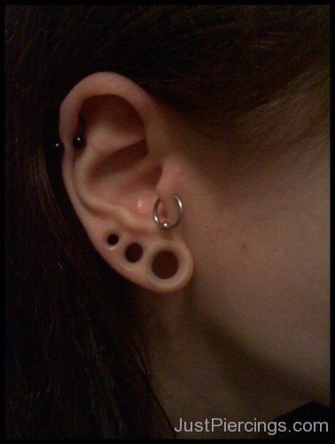 Tragus and Helix Piercings