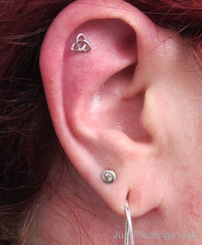 Anti Tragus And Helix Piercing