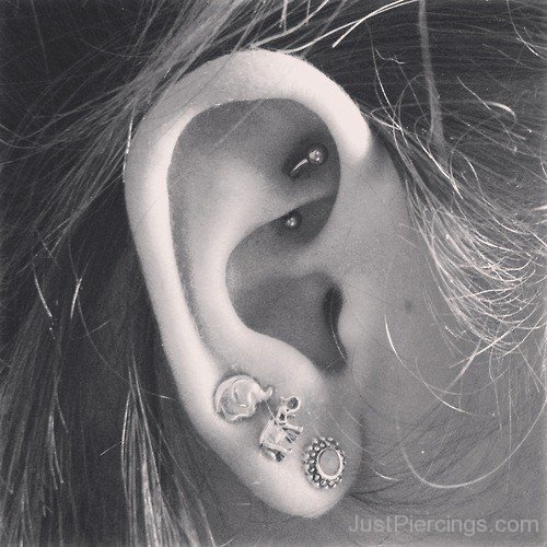 Anti Tragus Rook And Lobe Piercing