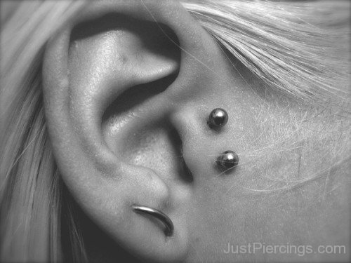 Dual Tragus And Lobe Ring Piercing