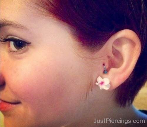 Flower Lobe And Tragus Piercing