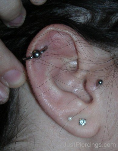 Helix Tragus And Lobe Piercing