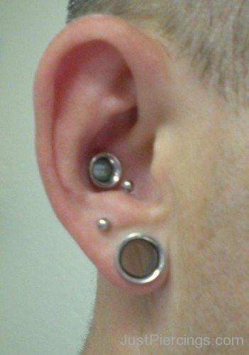 Lobe And Conch Piercing