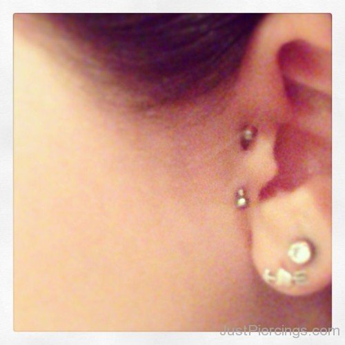 Lobe And Tragus Piercing