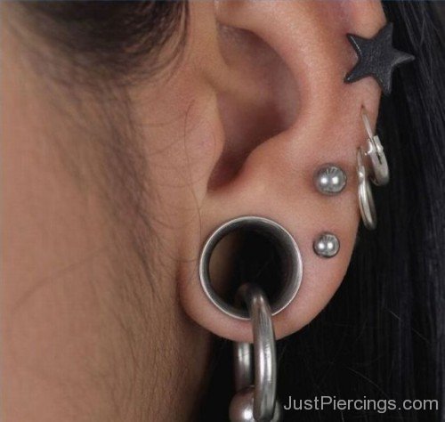 Lobe Anti Tragus And Helix Piercing