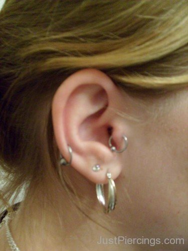 Lobe Tragus And Helix Piercing