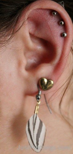 Long Lobe And Triple Helix Piercing