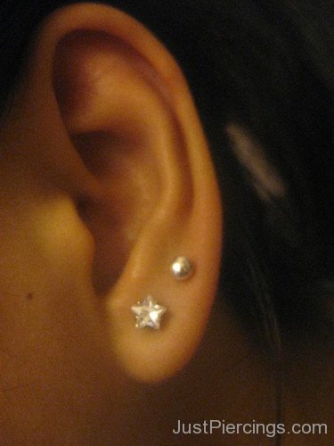 Star Lobe And Anti Tragus Piercing