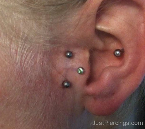 Tragus And Conch Piercing