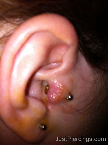 Tragus And Lobe Barbell Piercing