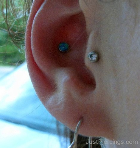 Tragus Conch And Lobe Piercing