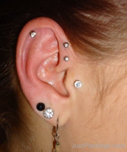 Tragus Helix And Lobe piercing