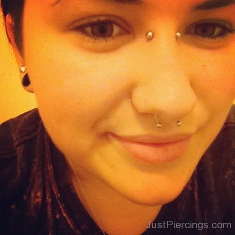 Bridge And Septum Piercings