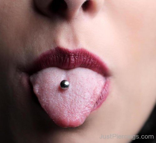 Woman With Tongue Piercing