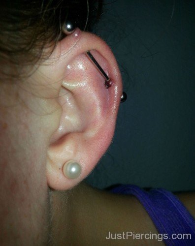 Left Ear Lobe And Scaffold Piercing For Girls