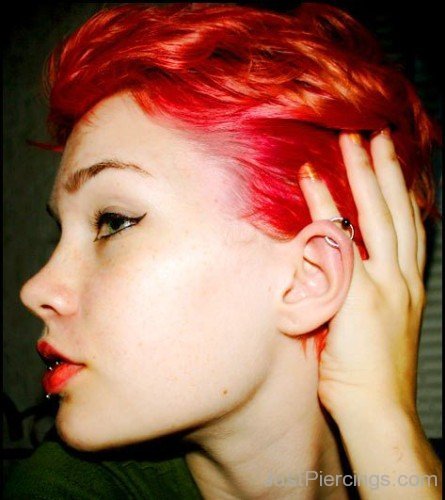 Girl Showing Orbital Piercing