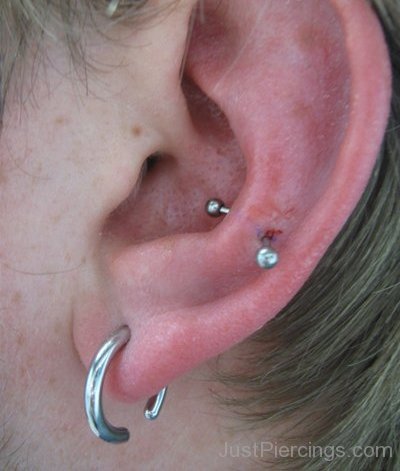 Snug Piercing And Lobe Piercing With New Ring For Ear