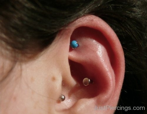 Snug,Tragus And Helix Piercing