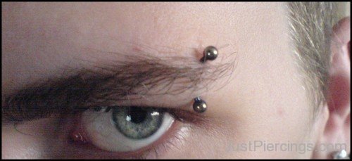 Close Up Of Eyebrow Piercings-JP123