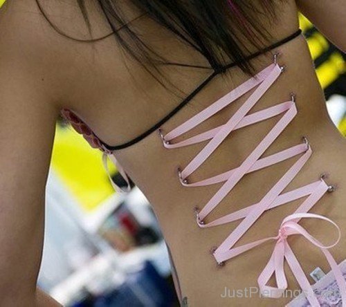 Corset Piercing On Back With Pink Ribbon-JP12311