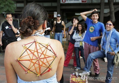 Back Colored Corset Piercing