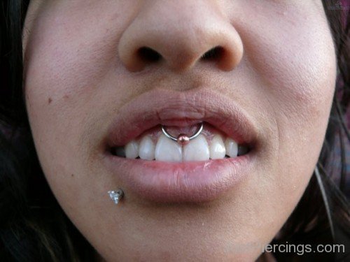 Beautiful Lower Lip And Scrumper Piercing