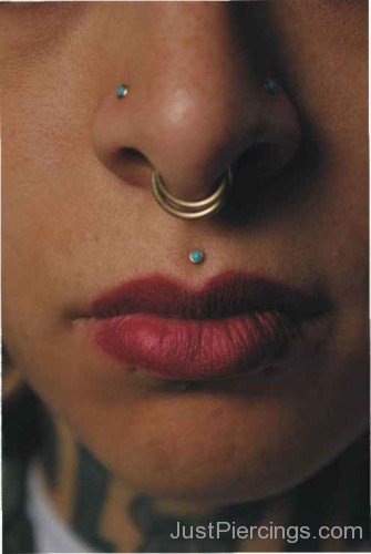 Septum Piercing With Double Piercing