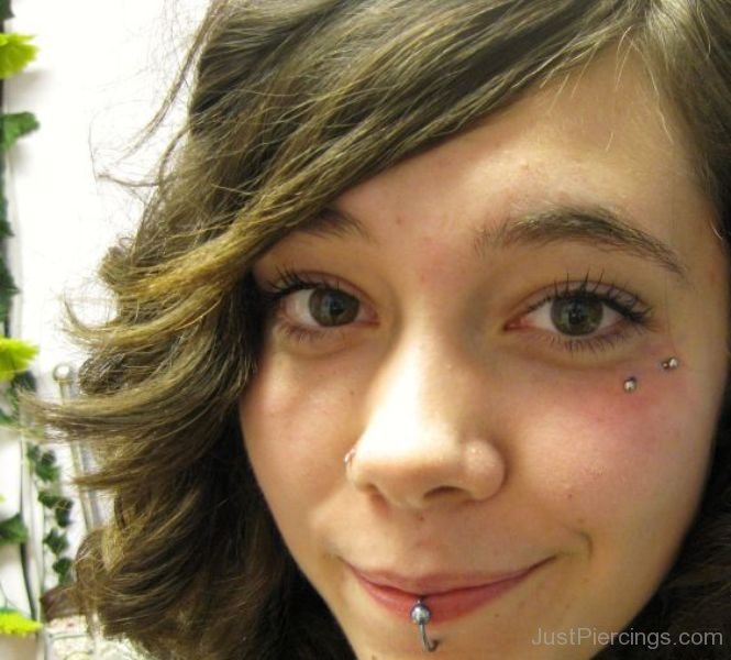 Smiling Girl With Anti Eyebrow Piercing
