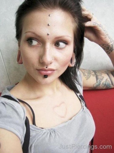 Girl With Bridge Piercing 