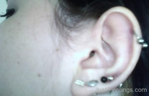 Cartilage Piercing With Circular Barbell And Lobe Piercings-JP1040