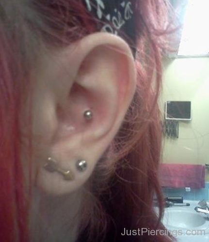 Conch Aand Lobe Piercing With Arrow Stud