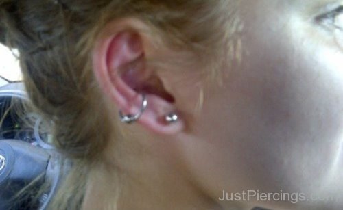 Conch & Lobe Piercing On Right Ear