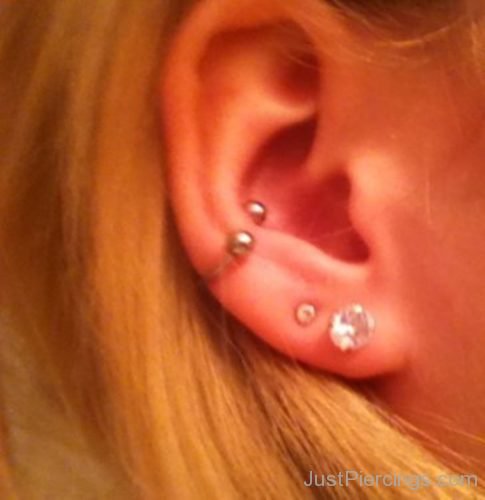 Conch Piercing And Dual Lobe Piercing