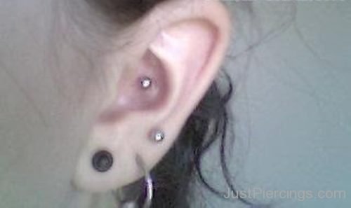 Conch Piercing And Lobe Piercing For Young Ladies-JP1064