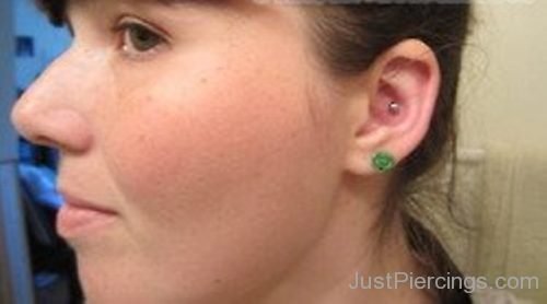 Conch Piercing And Lobe Piercing With Green Stud-JP1065