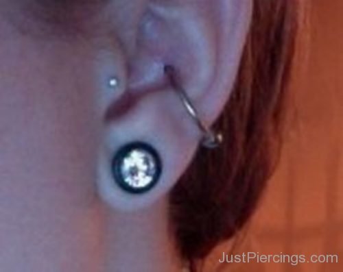 Conch,Tragus And Lobe Piercing On Ear-JP1107