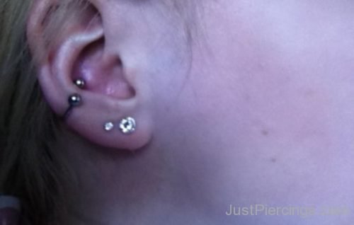 Dual Lobe And Conch Piercing On Ear-JP1127