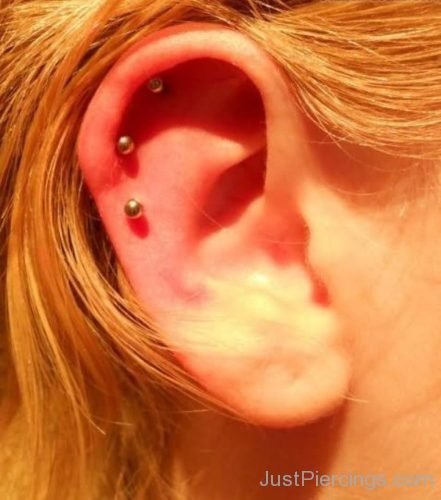 Ear Piercing With Silver Studs On  Ear-JP1033